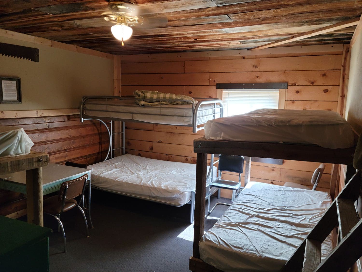 Seth Bullock bedroom with bunkbeds and table