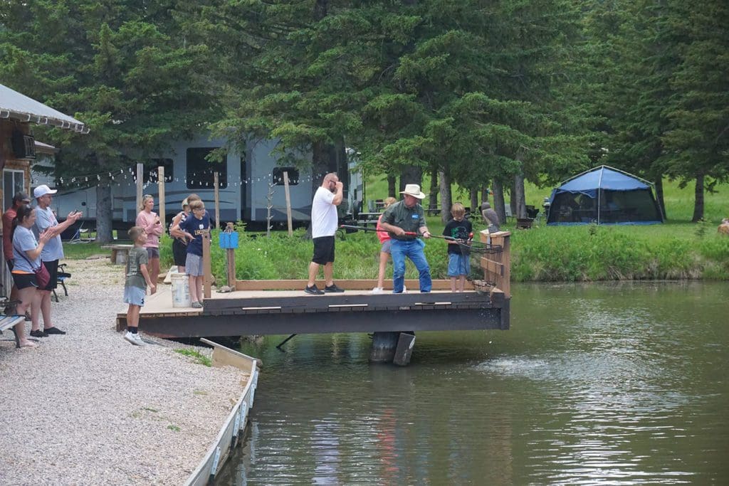 Family fishing on pier